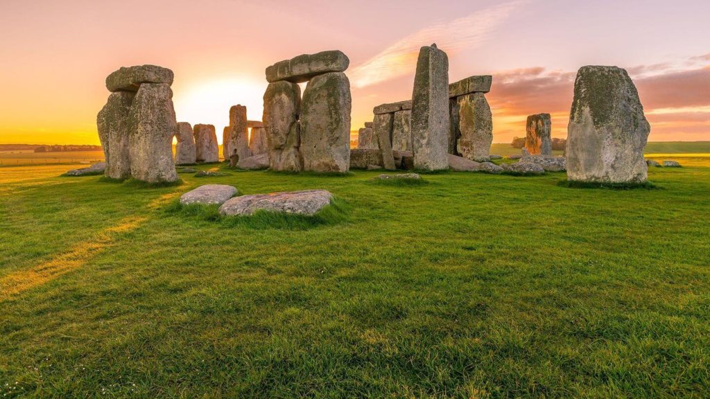 One of the best Trafalgar trips includes visiting Stonehenge at sunset in England.