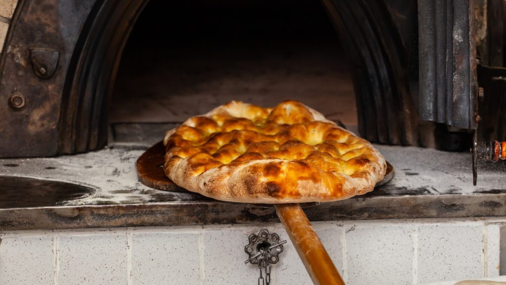 Pogača, a traditional Slovenian food, looks like an Italian  focaccia.