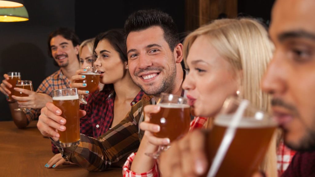 People in a bar drinking beer - Belarusian drinks