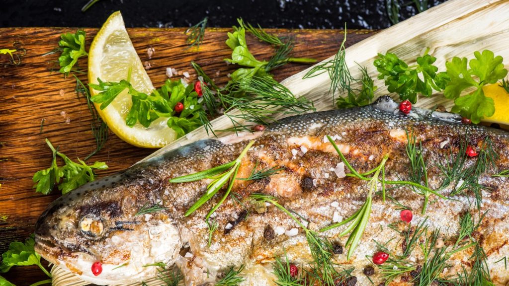 Slovenian freshwater fish rolled in buckwheat flour and fried.