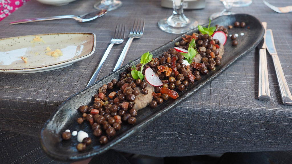 Grey peas on a plate in Riga