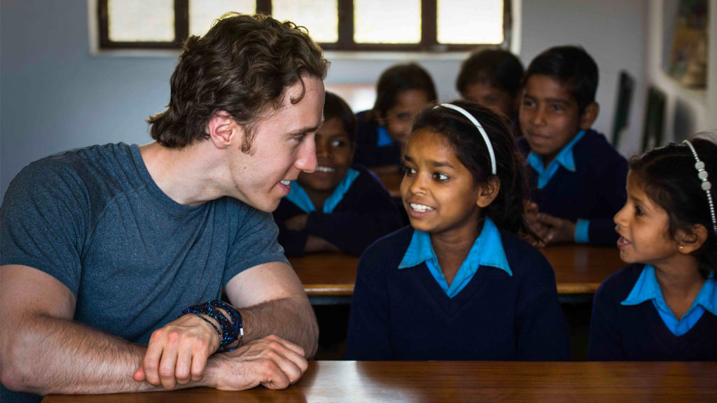 Foundation member speaking to school child