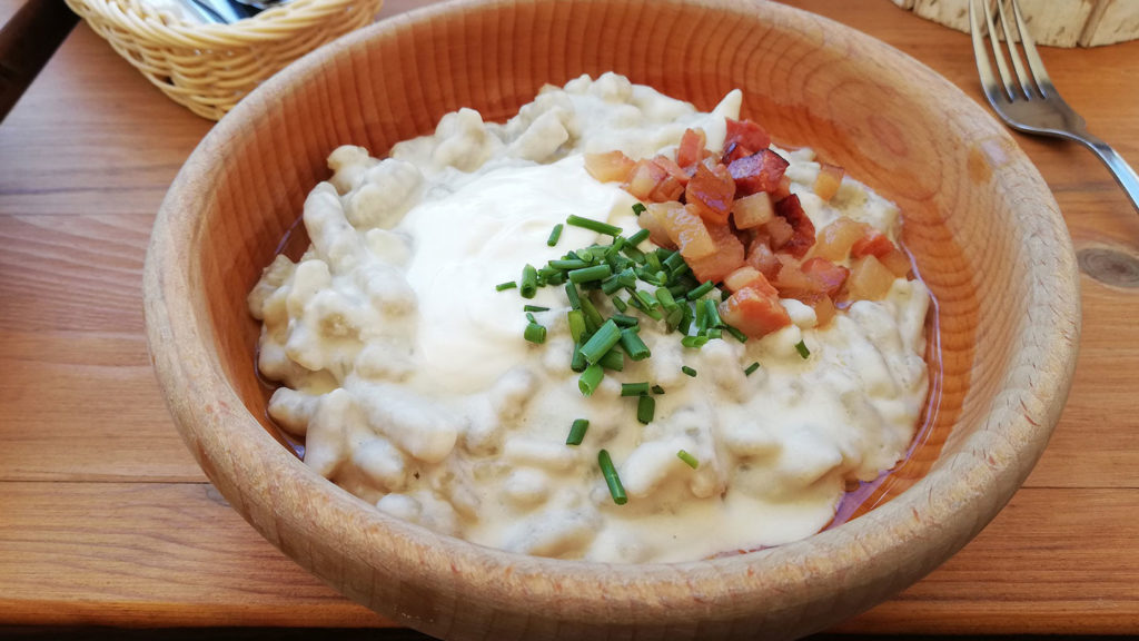Bryndzové halušky; Slovak potato dumplings with sheep cheese and bacon (national dish of Slovakia).