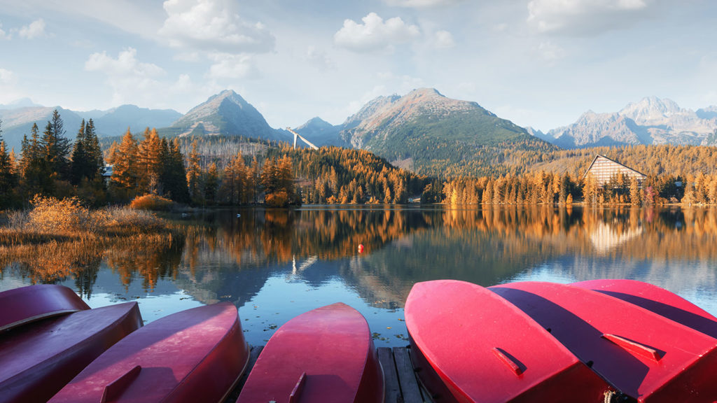 Red boats by the lake