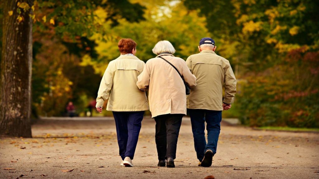 three people walking together