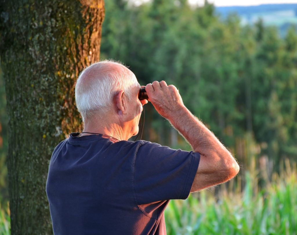 man with binoculars