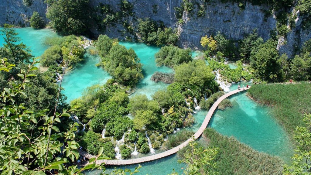 Plitvice Lakes National Park in Croatia features stunning natural beauty and crystal-clear lakes.