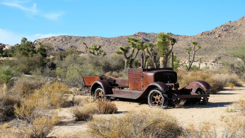old rusty car wall street mill Joshua Tree National Park