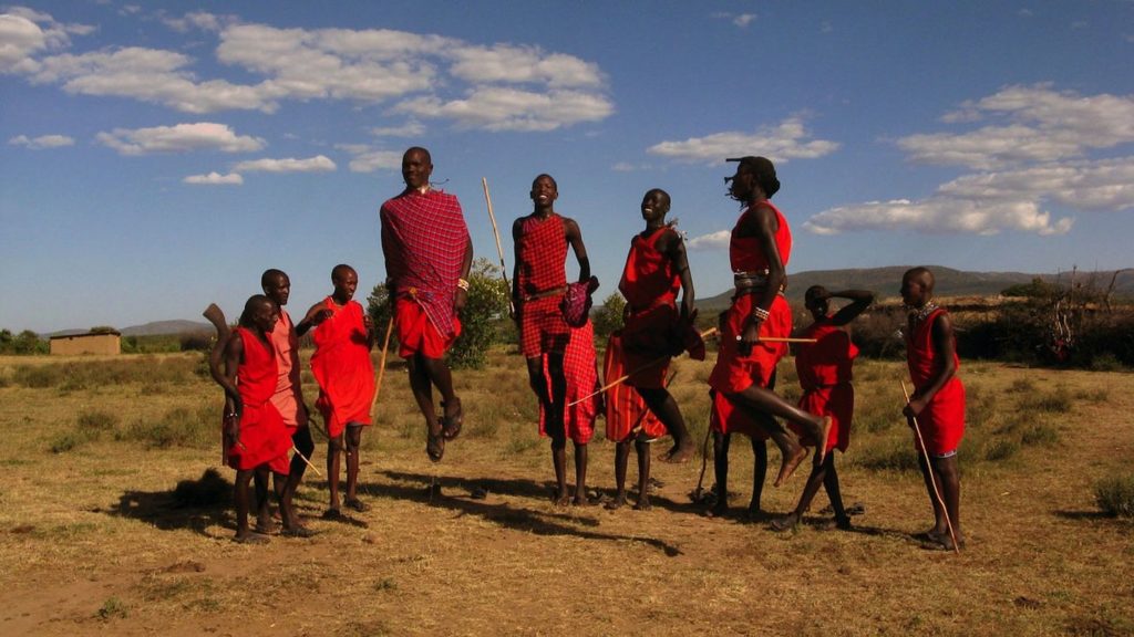 Maasai warriors in traditional red robes