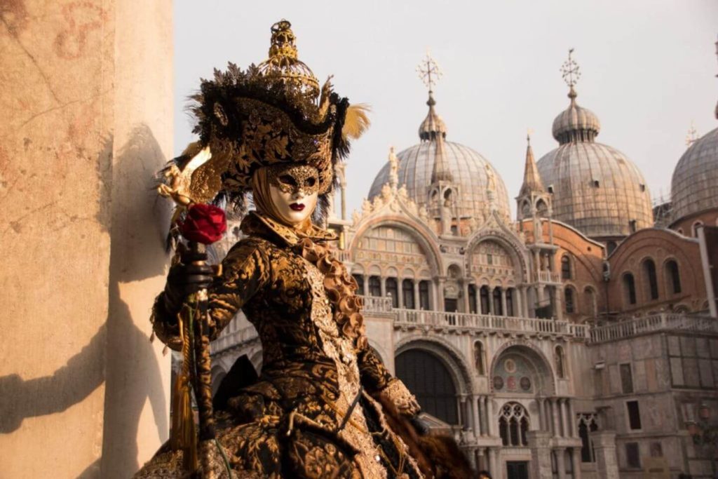 person in a traditional Venetian costume Venice Italy large family holidays