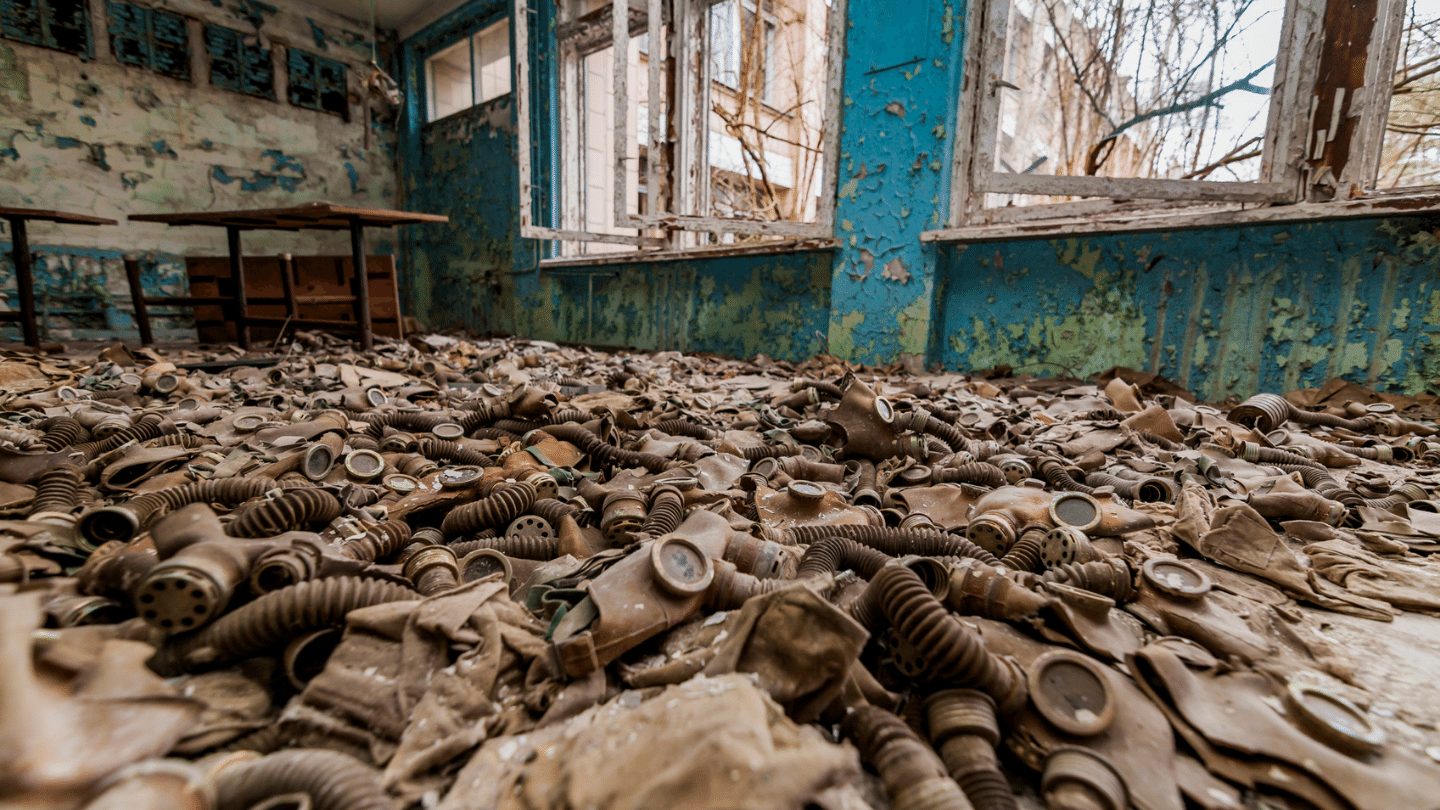 abandoned room filled with gas masks Pripyat, Ukraine