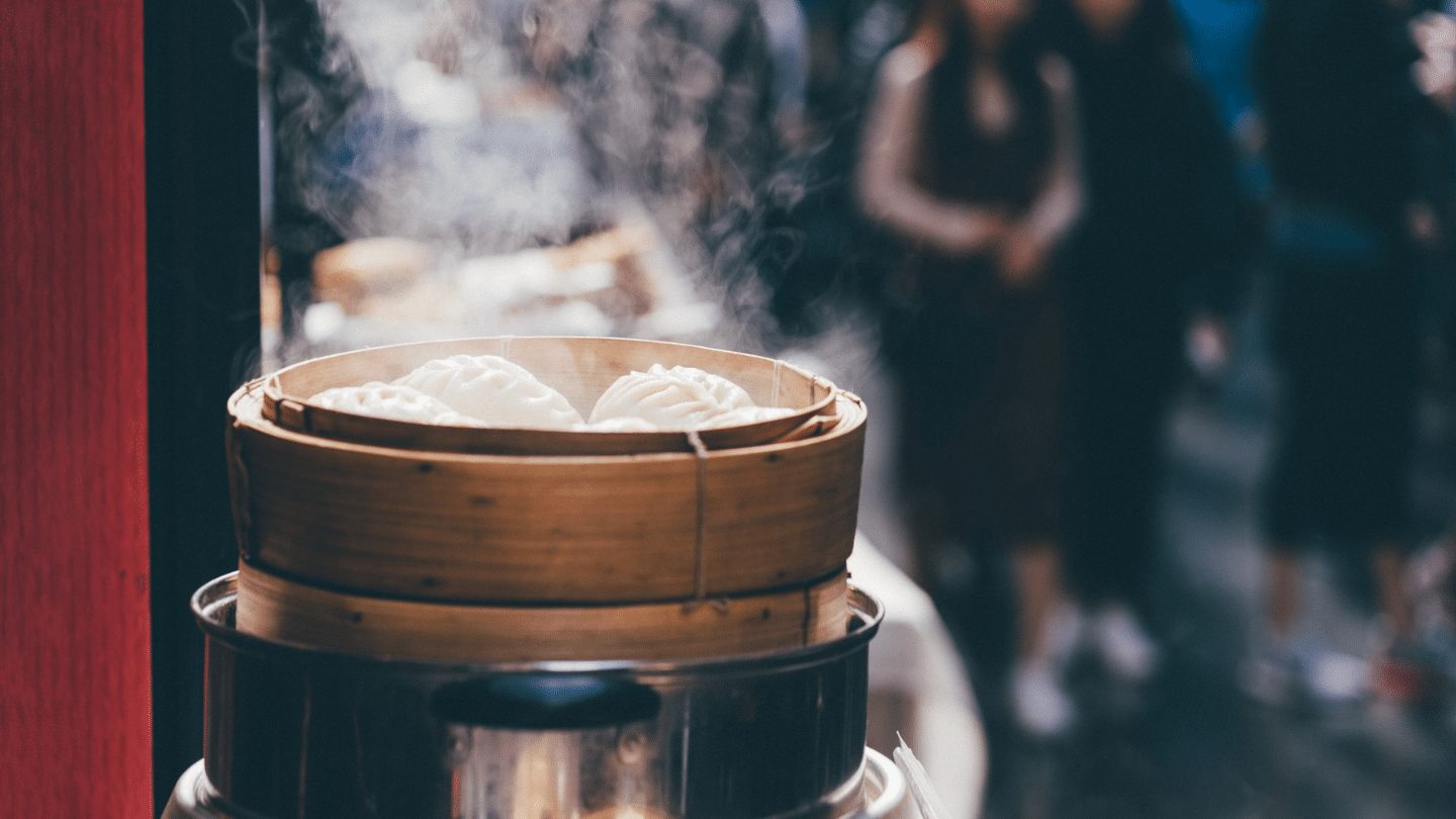 basket of steaming Chinese dumplings