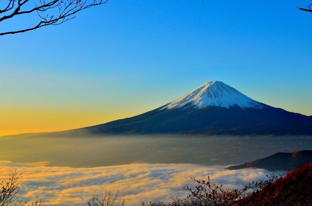 snow capped Mount Fuji at sunrise Japan