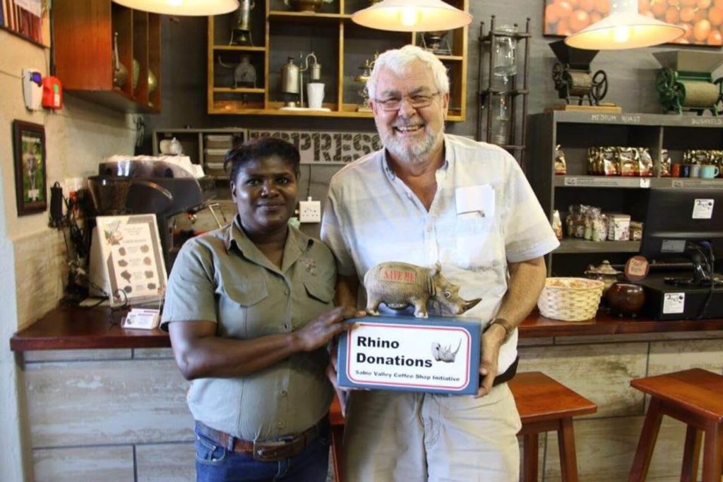 workers with rhino donations at the Sabie Valley Coffee cafe
