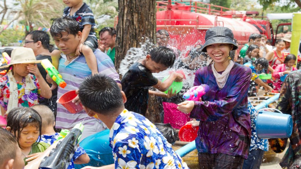 People with buckets of water celebrating Songkran