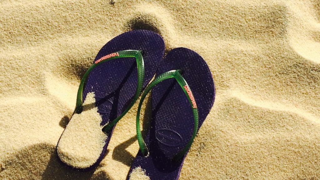 Flip flops in the sand
