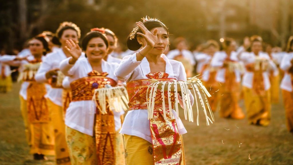 Indonesian women performing a traditional ceremony