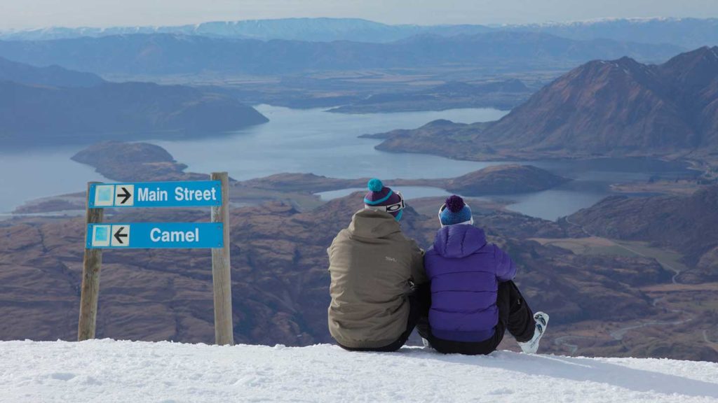 Two people looking at Lake Wanaka, New Zealand