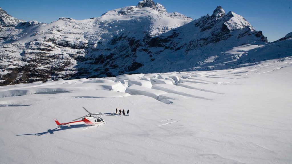 Glacier Southern Lakes Helicopter with mountain in the background, New Zealand.
