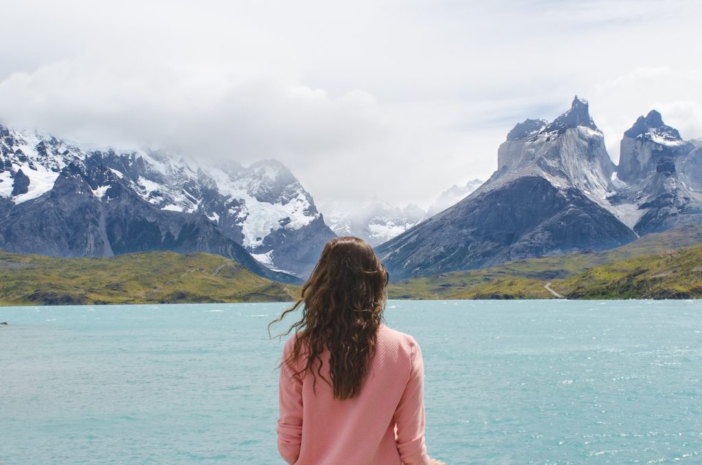 Woman looking at mountains in Patagonia