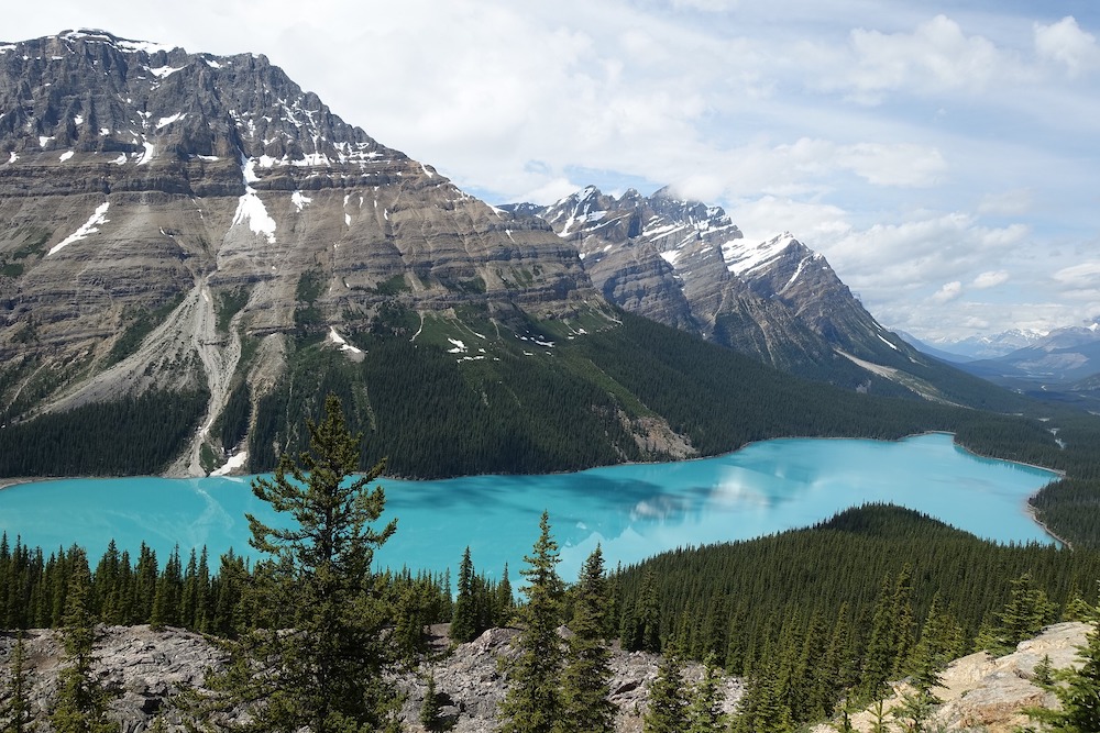 The stunning views of turquoise blue lakes and coarse glacier-carved mountains in Jasper National Park in Canada.