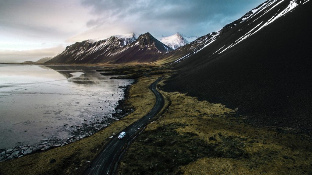 car driving on road in iceland