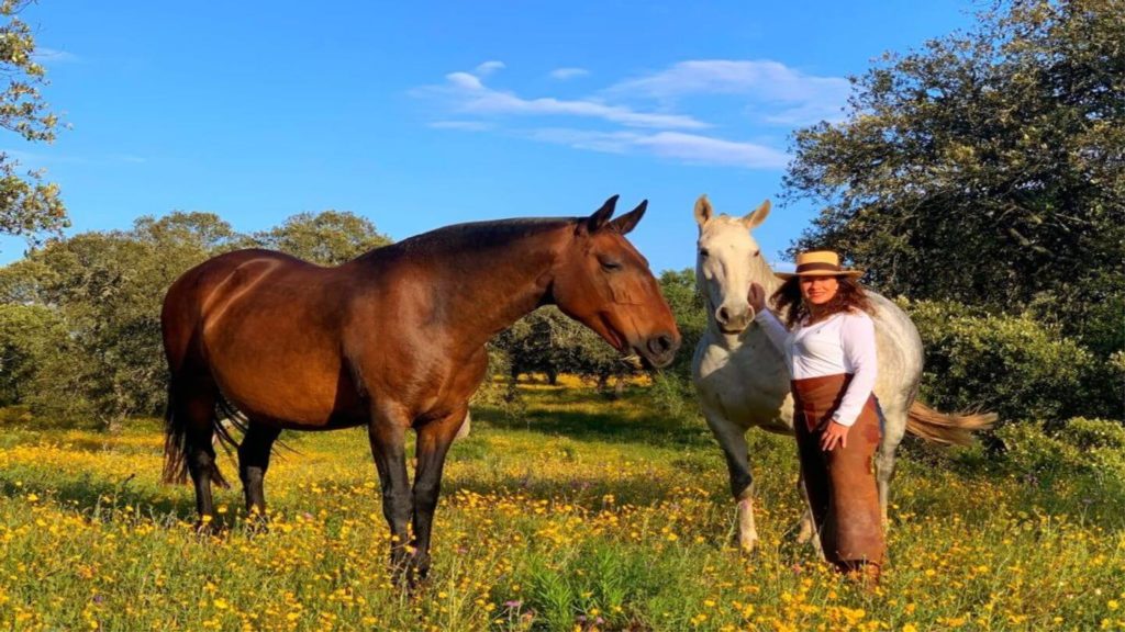 Vera with horses on stud farm in Portugal