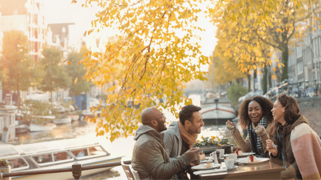 friends enjoying lunch outdoors in Amsterdam