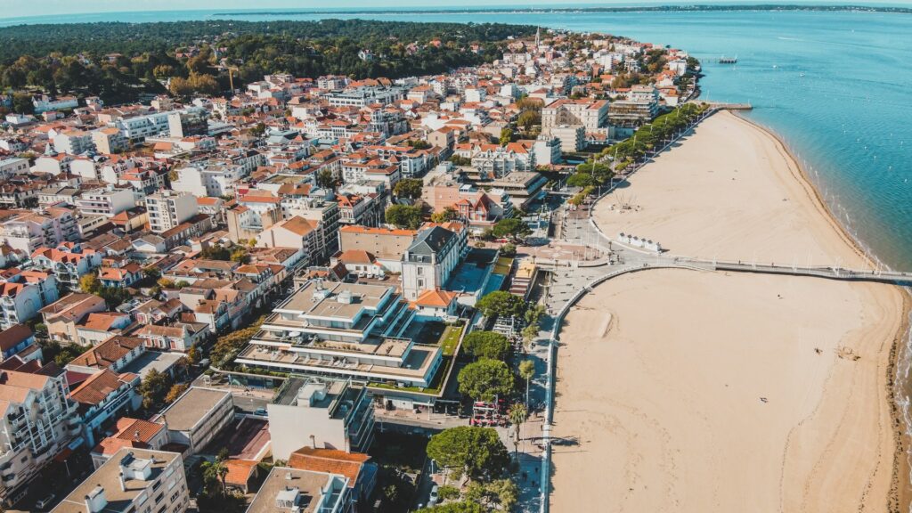 Aerial view of Arcachon beach with pier 