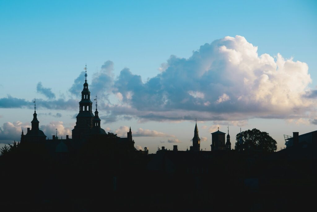 Copenhagen skyline silhouetted against a blue sky