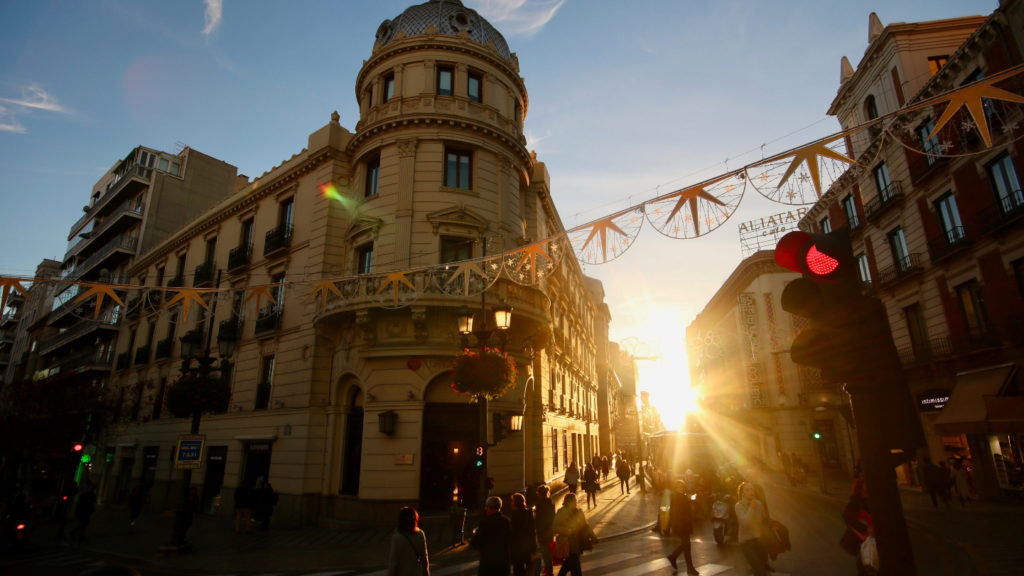 Sun shining down a street in Spain