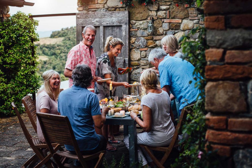 Trafalgar guests enjoying dinner outside
