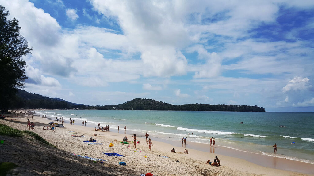 People relaxing on Bang Tao Beach, Phuket, Thailand