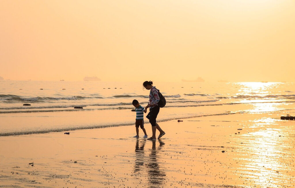 mother and daughter on the beach