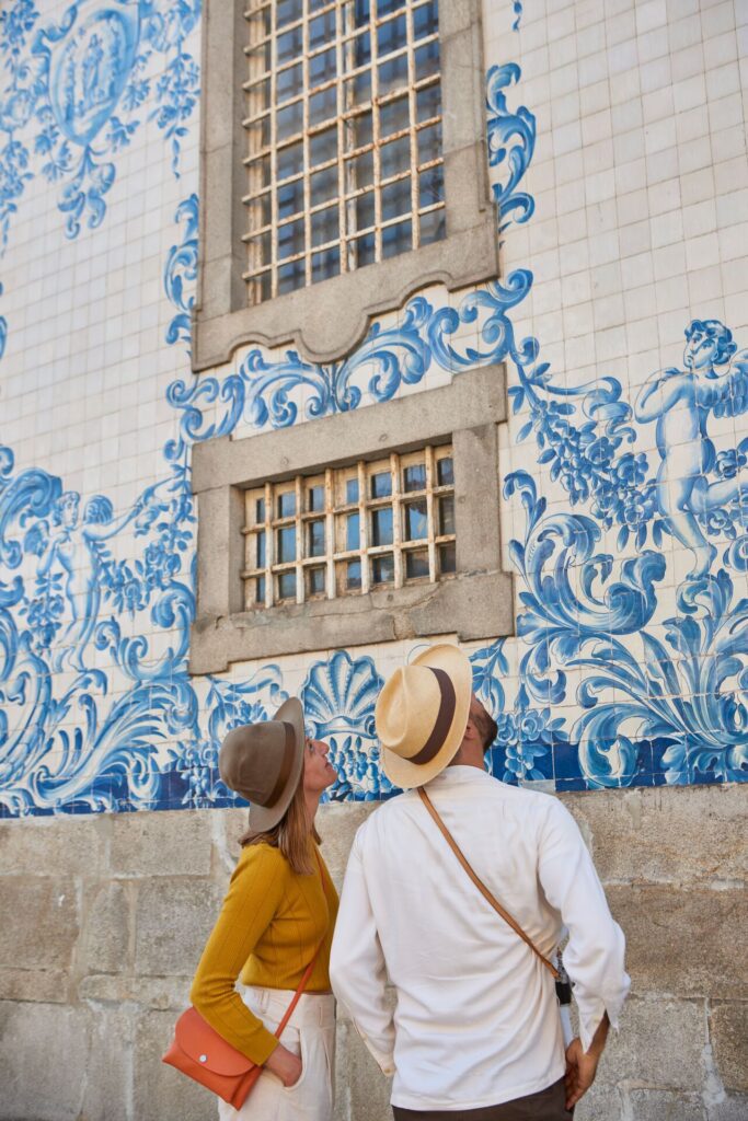 people marvelling at azulejo in portugal