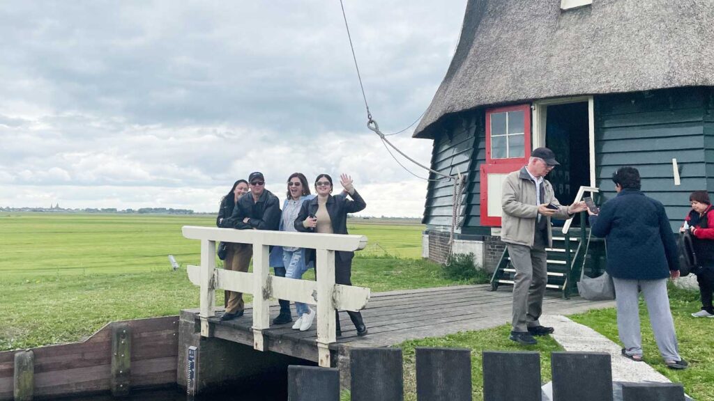 People visiting a windmill in the Netherlands