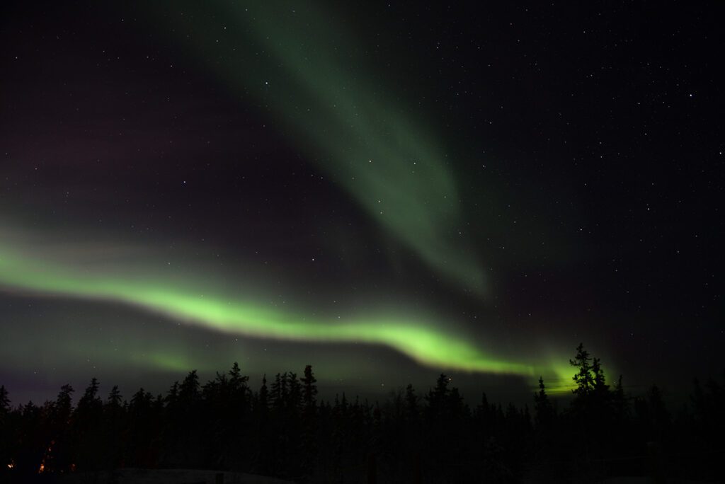 The Northern Lights cutting across the sky in Yellowknife, Canada.