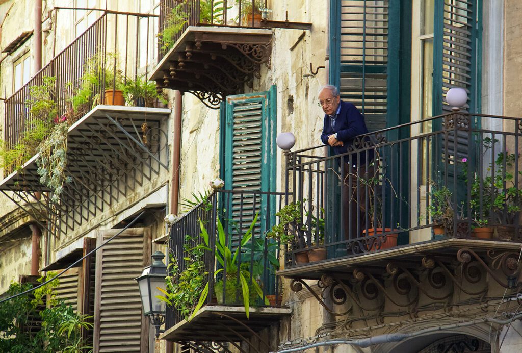 man on balcony
