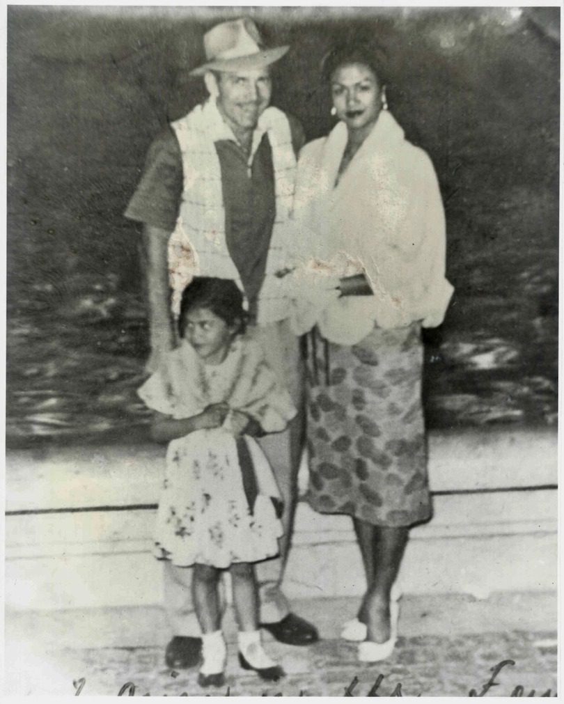 Dolores as a child with her parents at the Trevi Fountain in Italy