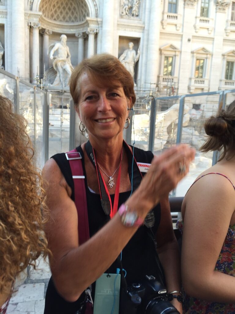Judy at Trevi Fountain on Trafalgar Italy trip