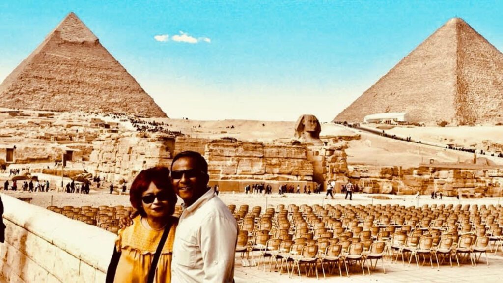 Image of Trafalgar Unlocked Award Winner Mita and her husband at the Great Pyramids of Giza