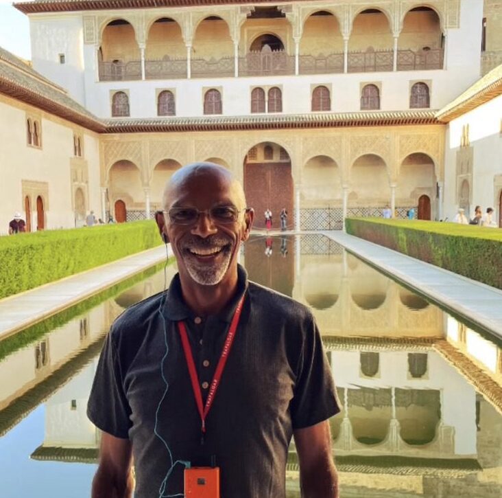 Image of Lawrence in a courtyard gardens in Cordoba 