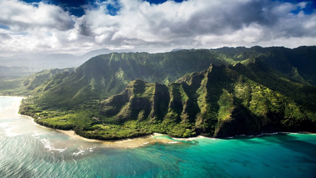 rugged green mountains by the ocean in Hawaii
