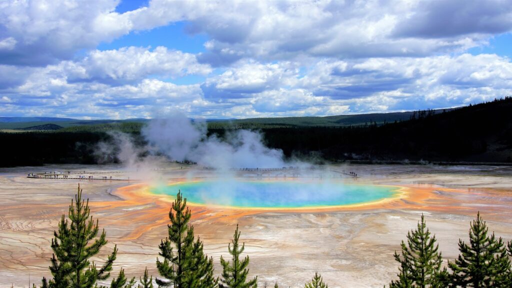 steaming turquoise geyser in Yellowstone National Park