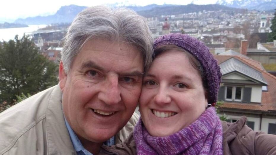 Father and daughter posing for a selfie in Switzerland