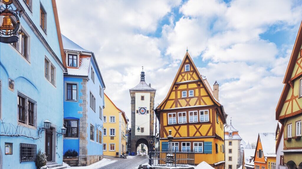 A corner of the German town of Rothenburg ob der Tauber. Medieval houses covered in snow look like a fairytale winter wonderland