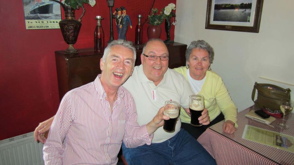 Kim with her guide Brian on tour in Ireland