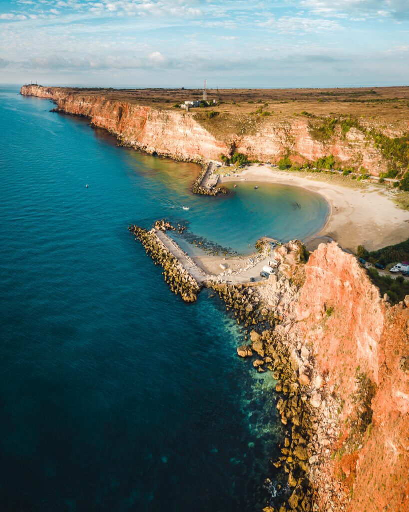 Bolata's fascinating curved bay is shown from above here, with the rocky cliffs stretching out into the horizon just like something from the Algarve.