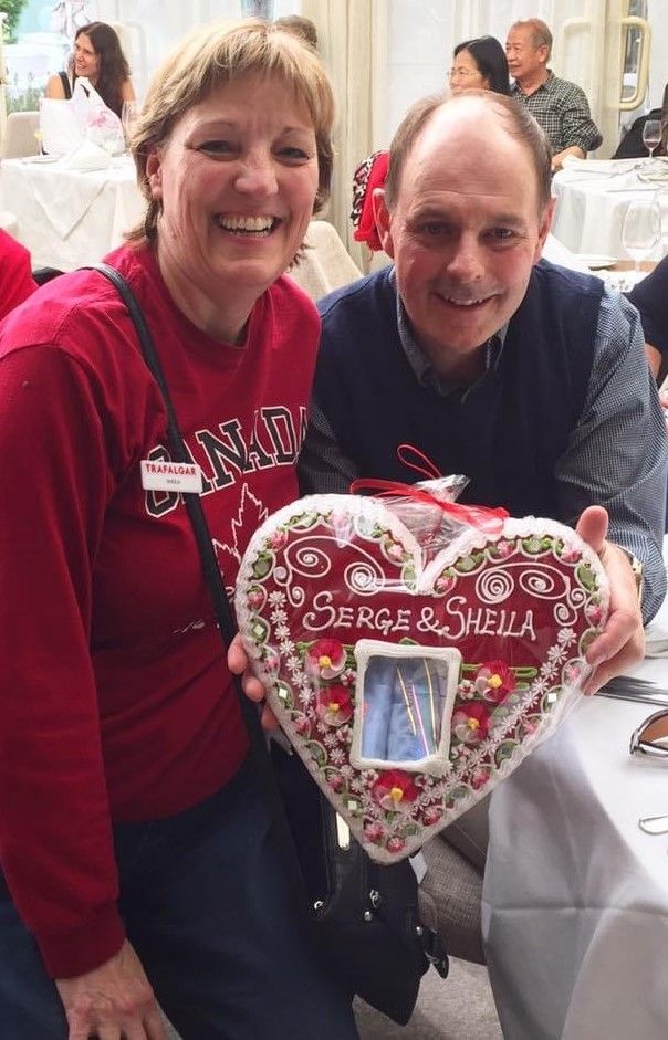 Sheila and Serge hold up their gift of a local souvenir in Croatia 