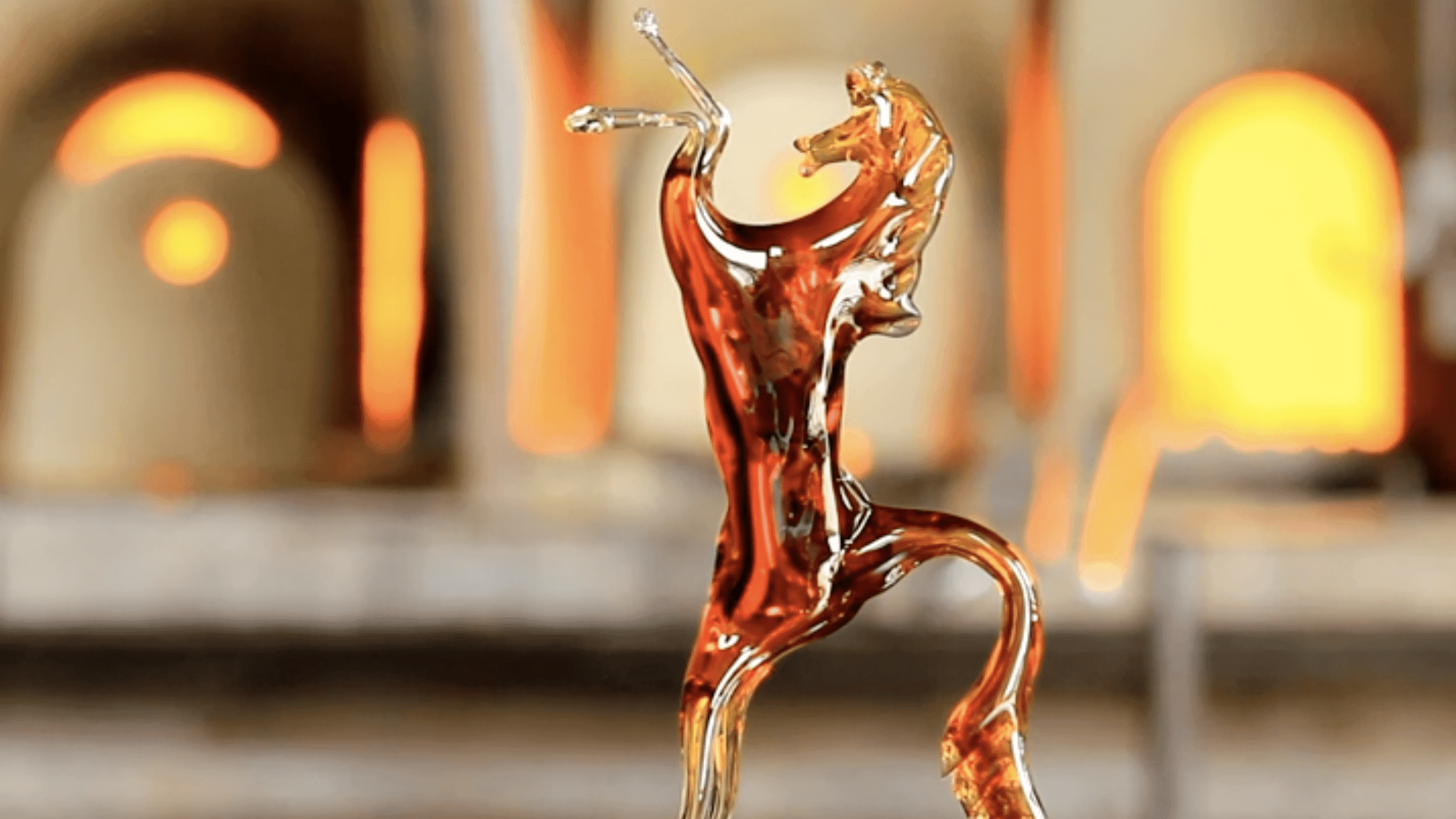 Close-up of a glass horse standing up tall 